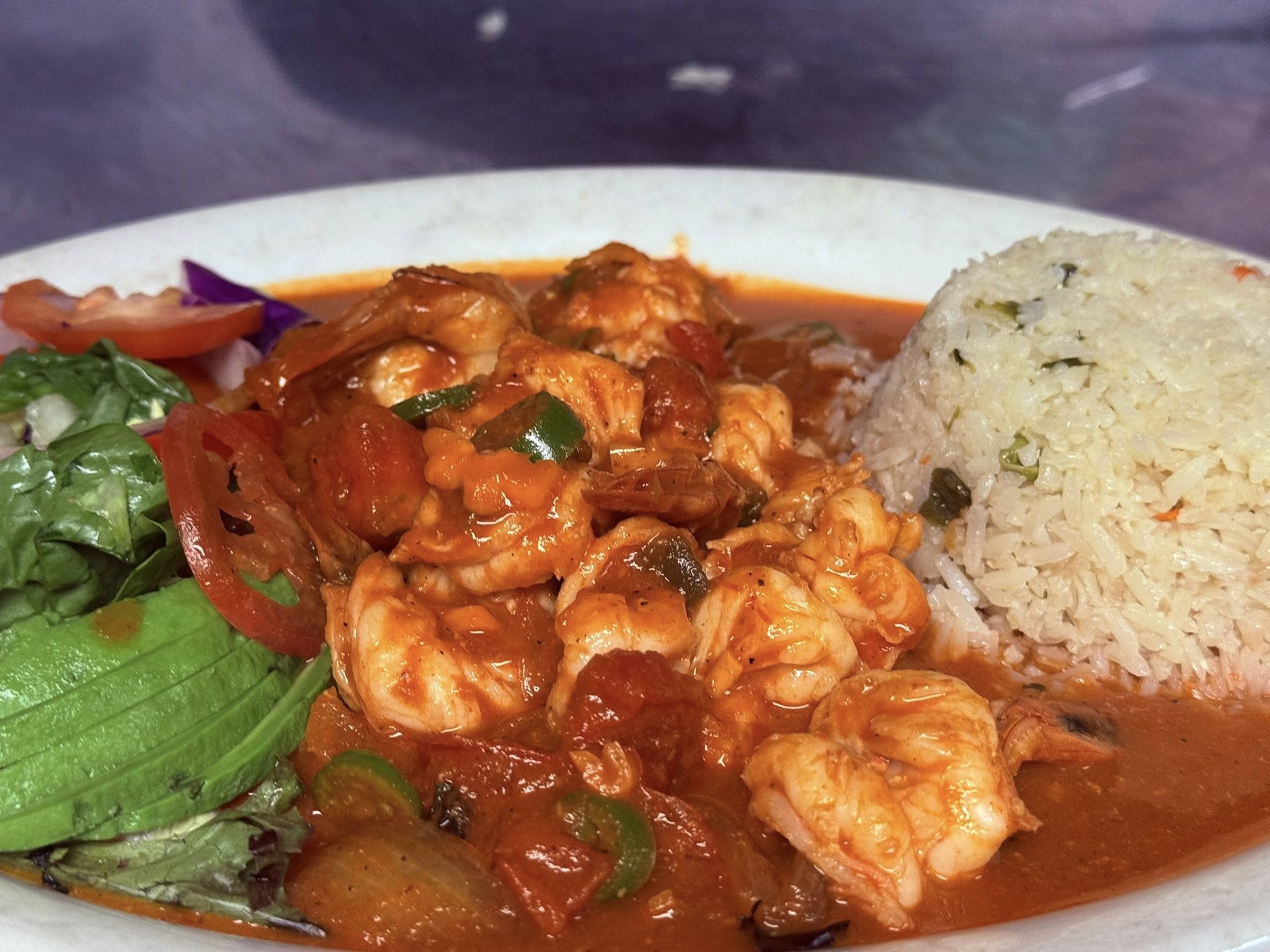 Camarones a la diabla with rice and avocado